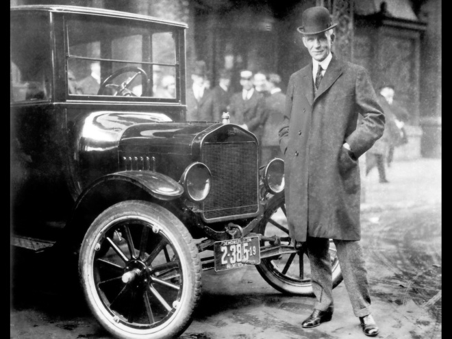 Henry Ford With 1921 Model T - Ford Motor Company (wikimedia commons) Henry Ford With 1921 Model T