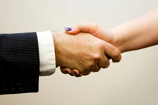 handshake man woman credits Flazingo photos (CC BY-SA 2.0)