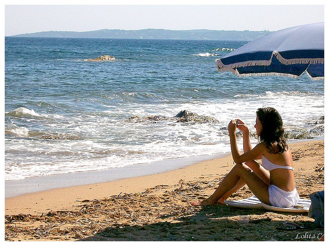Vacances, plage - Crédit photo : Lolita C. via Flickr (CC BY-ND 2.0)