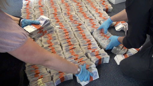 West Midlands Police-Seized cash(CC BY-SA 2.0)